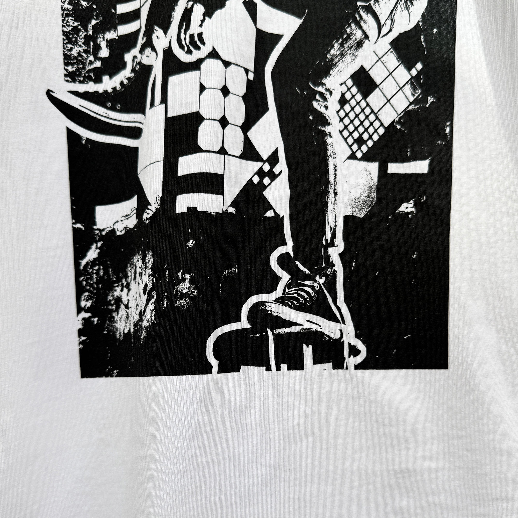 Minotaur Rock - Organic Cotton T Shirt - close up detail shot bottom