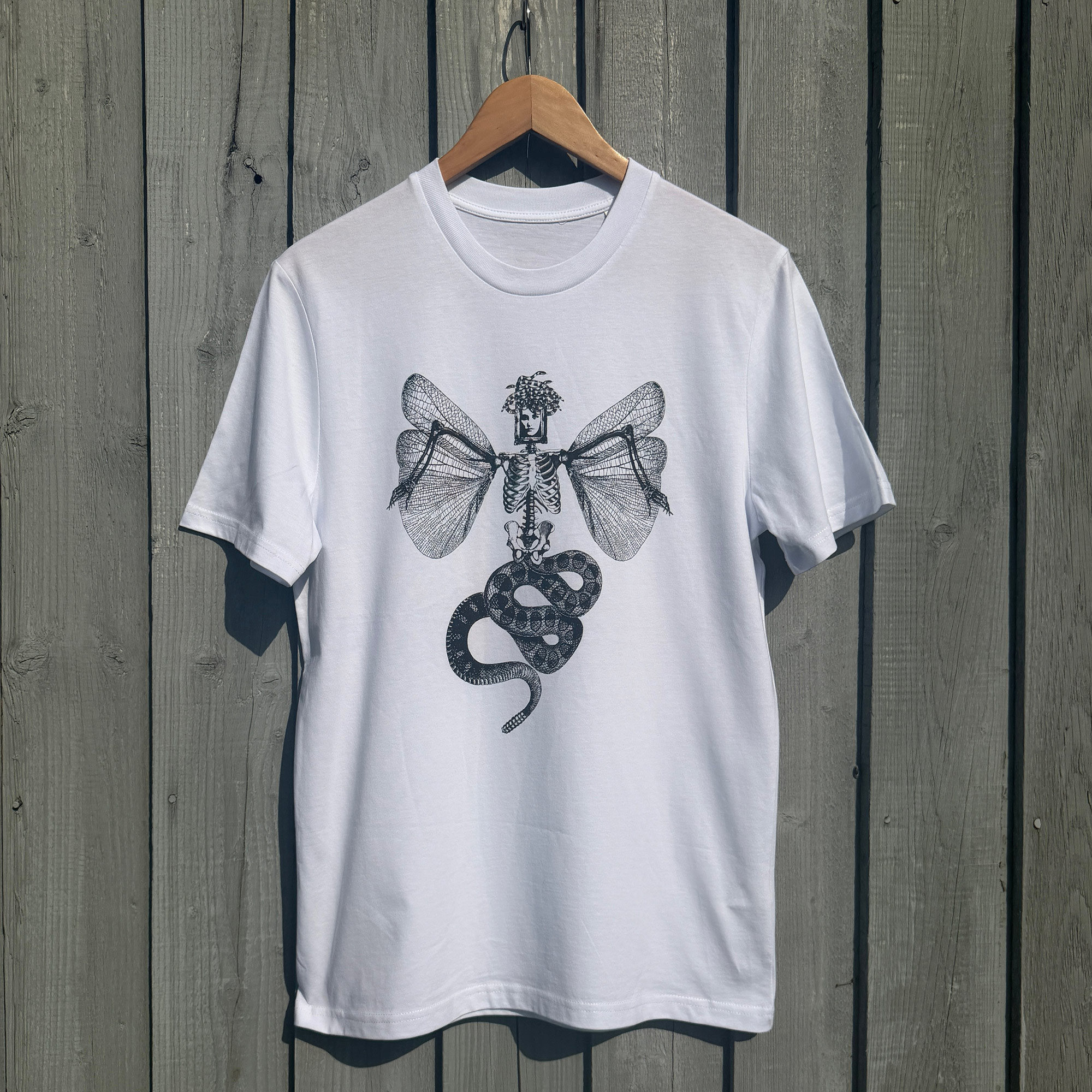 Medusa_Organic Cotton T Shirt - against wooden backdrop